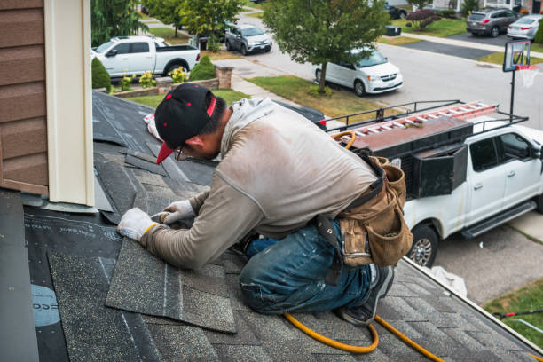 Professional Roofing technician working in Goshen, CT